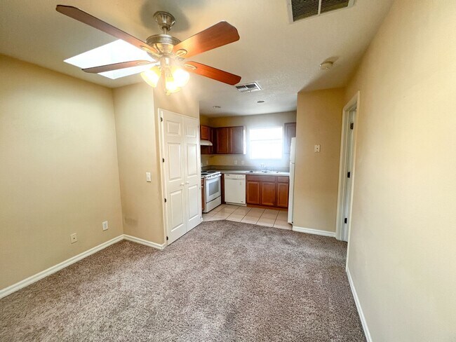 Building Photo - MOVE IN NOW-Water & electricity included 1x1 above garage apartment!! Full kitchen & bathroom!! W...
