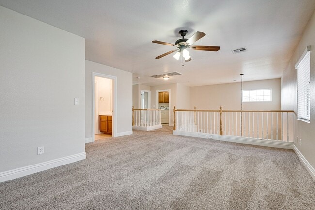 Building Photo - Spacious 3-Bedroom Home Featuring Downstai...