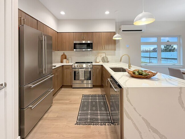 Building Photo - New Construction 4-Bedroom Residence in Garden City — 2 Primary Suites, Pet-Friendly, EV Charger ...