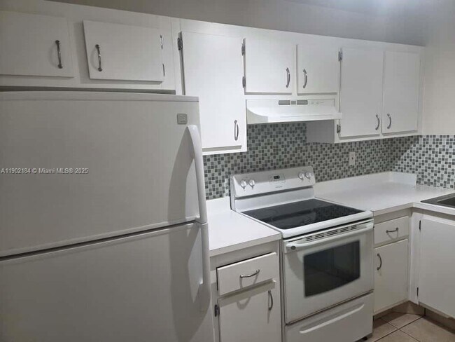 Building Photo - 7406 Woodmont Terrace