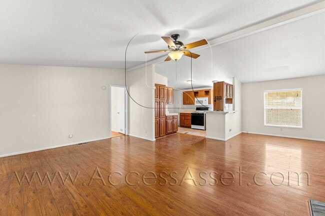 Building Photo - Spacious 3 Bedroom Home with Large Fenced Yard and Two-Car Garage