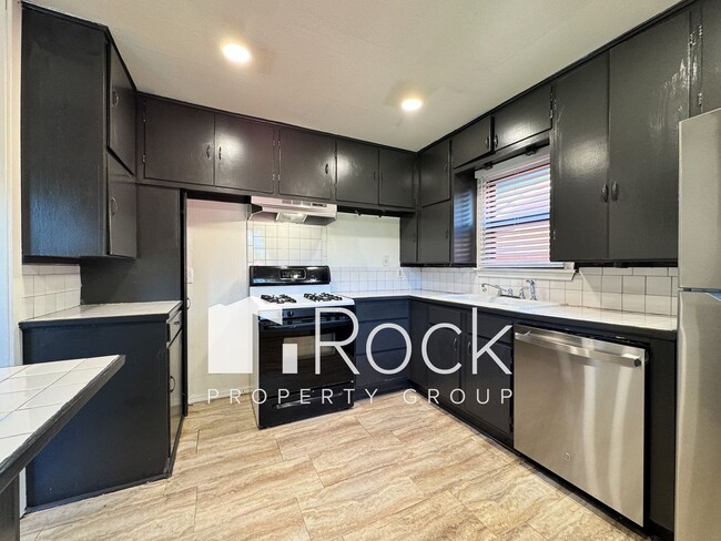 Primary Photo - Charming Home with Real Wood Floors and Covered Parking ~ Offering 1 Month FREE Rent~