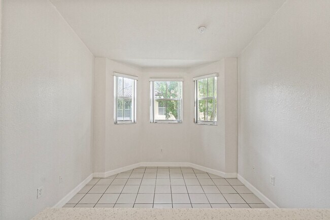 Building Photo - 2-bath condo on the 2nd floor with a newly...