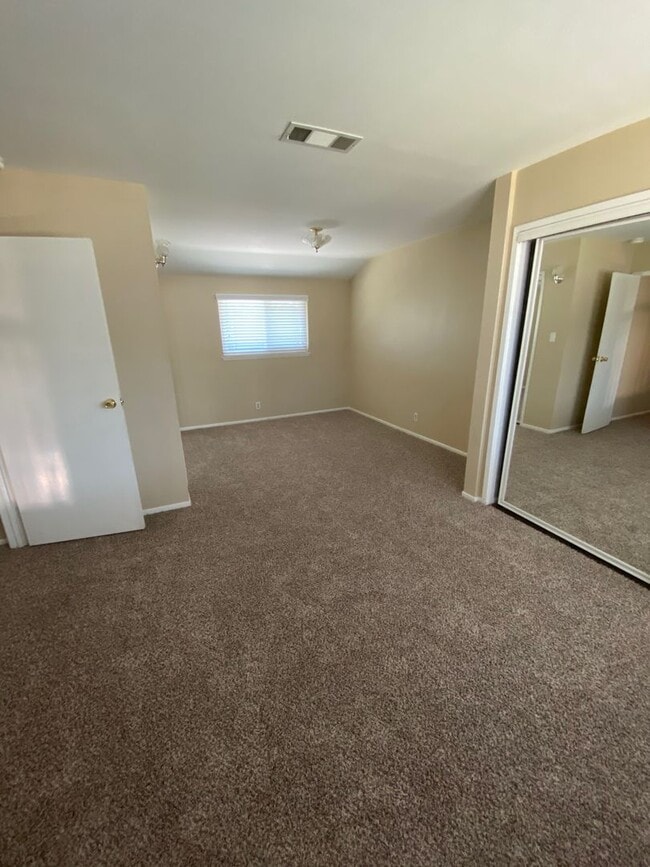 Building Photo - 2 story 4 bed, 2 bath home with yard