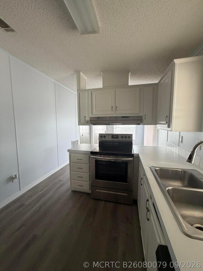 Building Photo - 8179 Sandwedge Terrace
