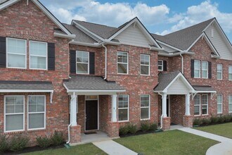 Building Photo - **BE THE LUCKY ONE TO LIVE IN THIS 2024-BUILT BRICK TOWNHOME IN THE VILLAS AT REGAL SQUARE FEATUR...