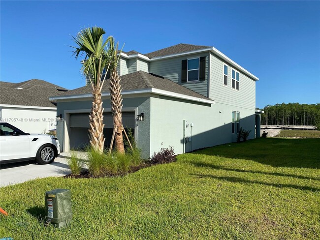 Building Photo - 5647 Ficus Aurea St