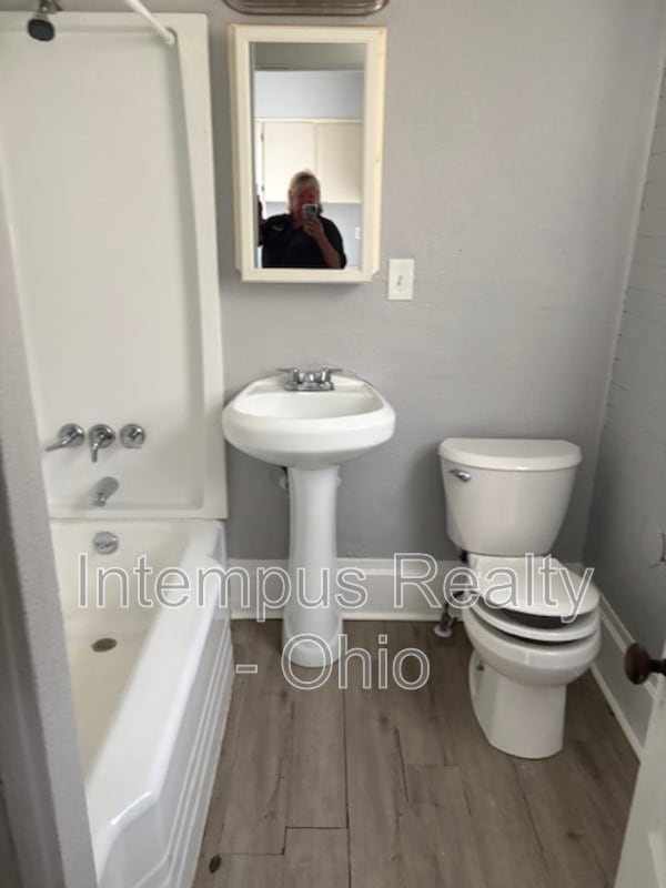 Building Photo - 112 E. Second Street - Down