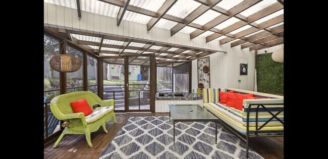 Lots of natural light w/ fiberglass roof & equipped w/ water feature and movie projector - 2740 Alabama Ave S