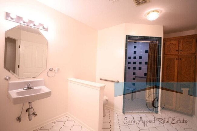 Building Photo - First month move in special $900!! Beautiful 3-bed, 2 bath condo with fireplace, 2-car garage - i...