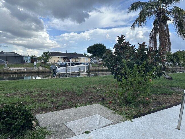 Building Photo - "Elegant 3-Bed Waterfront pool Home"