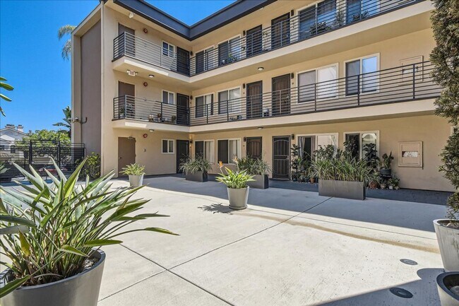 Building Photo - MOVE IN SPECIAL- Live in the Heart of Nort...