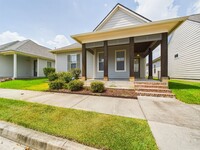 Building Photo - COMING SOON! Welcome to your charming rental home, where comfort and style come together seamlessly!