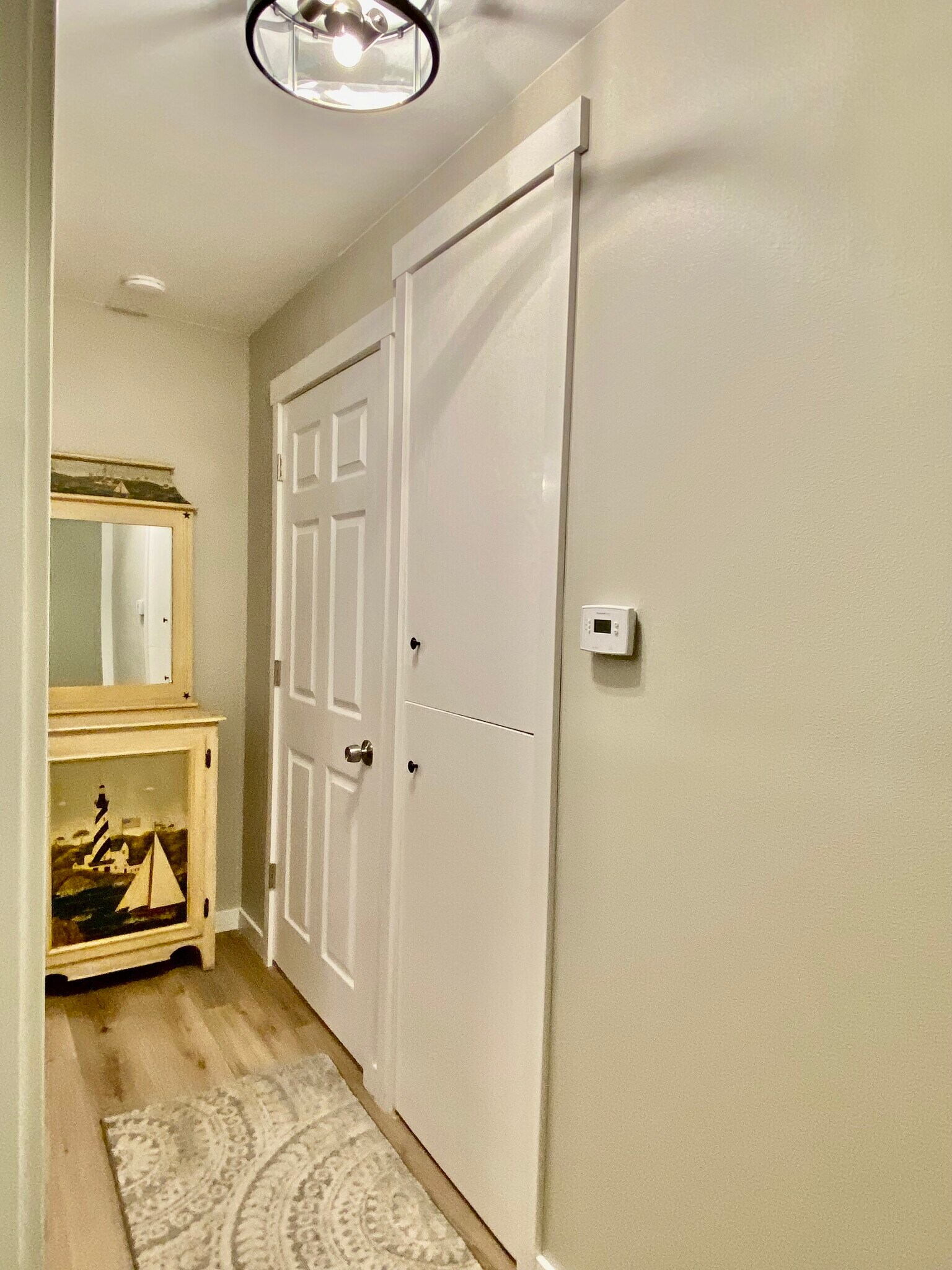 Door to bathroom next to hall linen cabinet - 1554 NW 35th Pl
