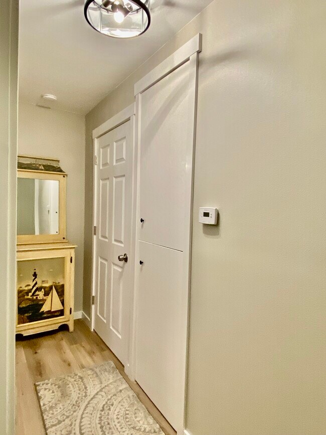 Door to bathroom next to hall linen cabinet - 1554 NW 35th Pl