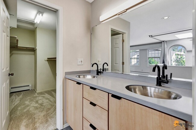 Building Photo - Spacious and bright condo located in a quiet area that boasts the perfect combination of style an...