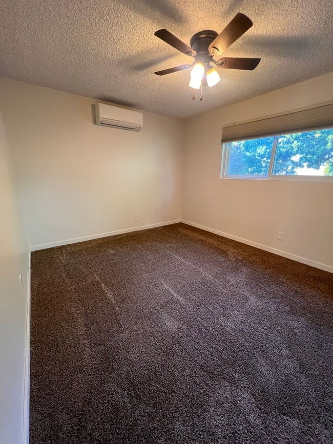 Building Photo - Private Back House with single garage & yard