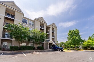 Building Photo - Luxurious Condo Living in Gated Stonegate ...