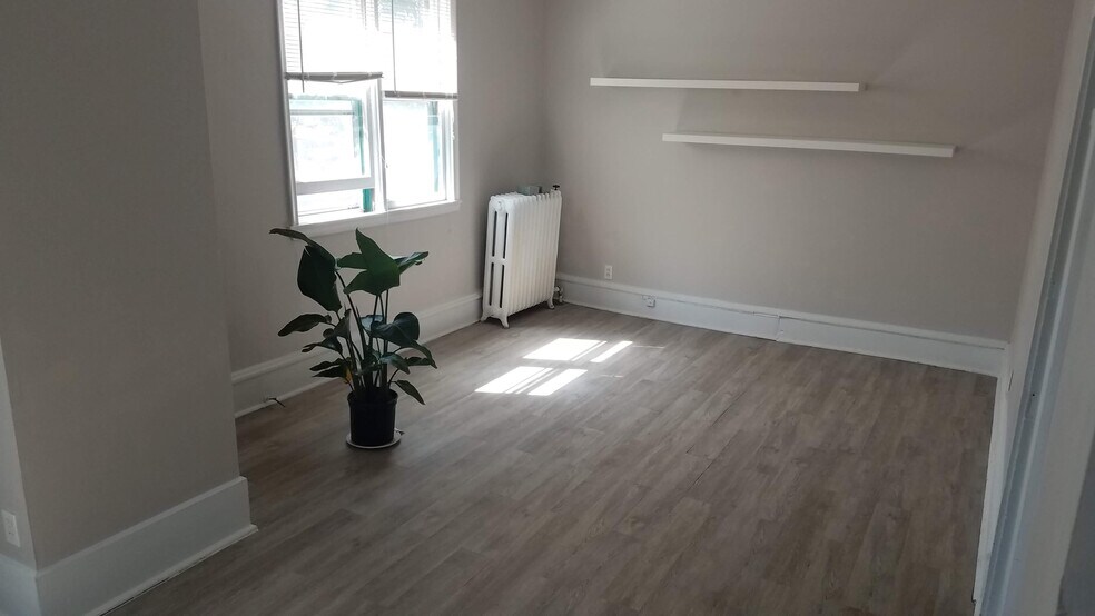 New flooring and paint in living room - 2720 Emerson Ave S
