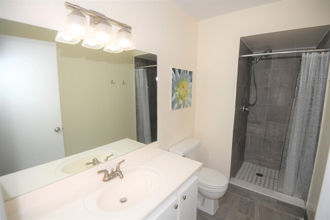 Remodeled master bathroom. - 3071 SE Aster Ln