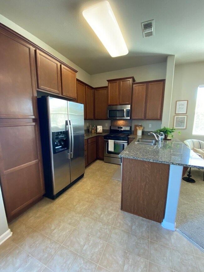 Building Photo - Contemporary 3 Bedroom Capital Village Townhome