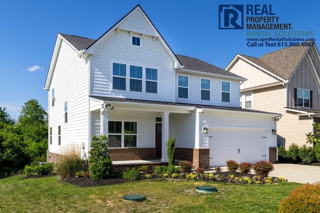 Building Photo - Great 4 bd 2.5 ba with attached garage and large deck!