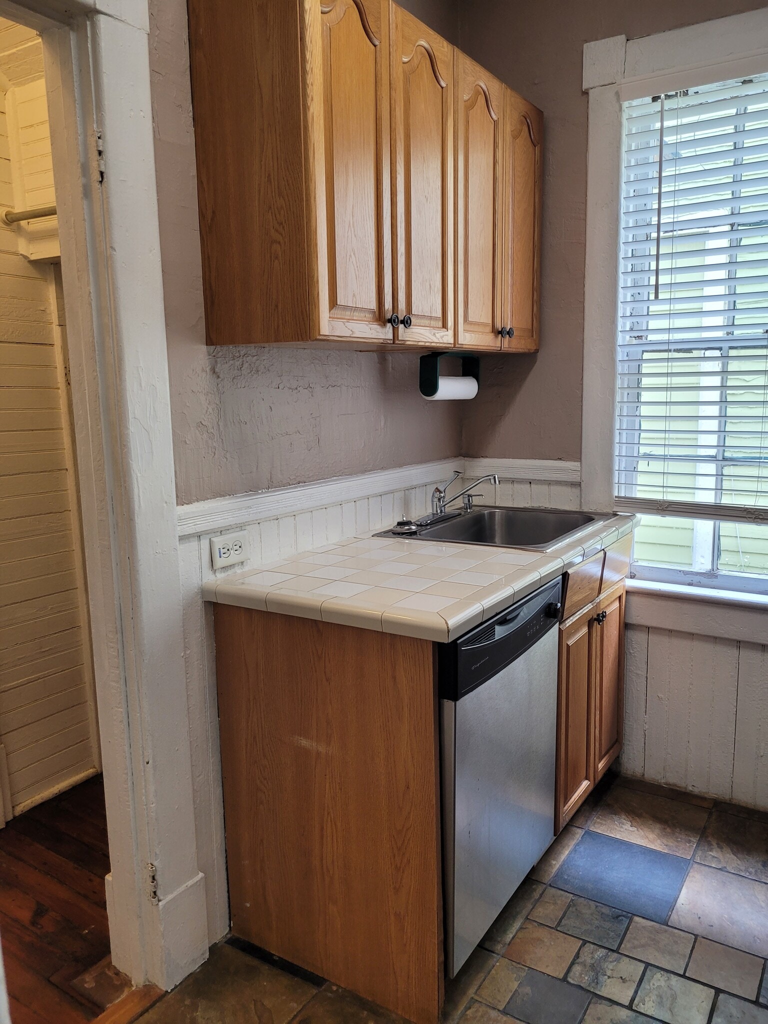 Kitchen-All Electric Appliances: Dishwasher. Window overlooks patio. Slate floor. - 1215 Java Pl