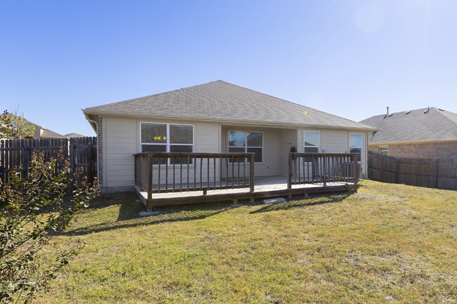 Building Photo - Kyle Home has Large Deck for Entertaining!