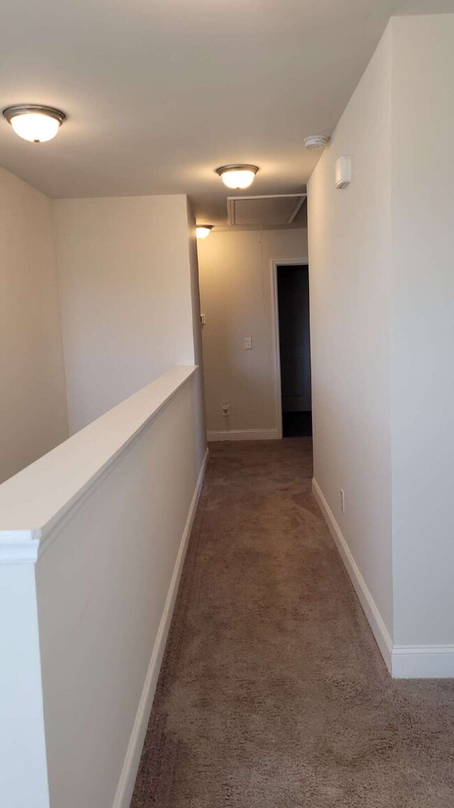 Building Photo - "Spacious 4-Bedroom Retreat with Modern Gr...