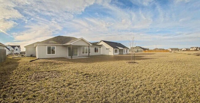Building Photo - Newly Built! + Stainless Steel Appliances + 3-Car-Garage + Large Backyard + Washer & Dryer Includ...