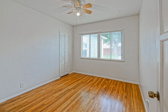 Building Photo - Bright & Charming, Single Story 3BR2BA Home w/ Large Front Yard, Huge Fenced Rear Yard w/ Large D...