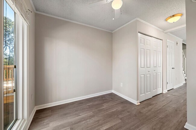 Building Photo - Introducing a Charming End Unit Townhouse ...