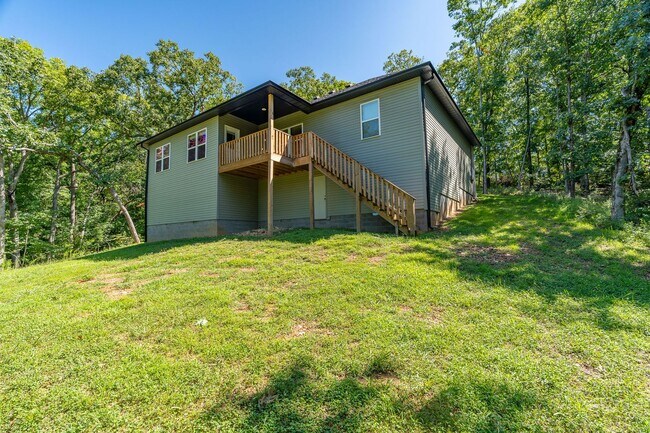 Building Photo - Nearly New Bella Vista Home Nestled in Ultimate Privacy! Furnished options available!