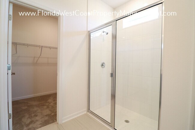 Building Photo - OUTSTANDING 3 BEDROOM/2 BATH IN EAVE'S BEND/ARTISAN LAKES PALMETTO! SEMI FANCED YARD!