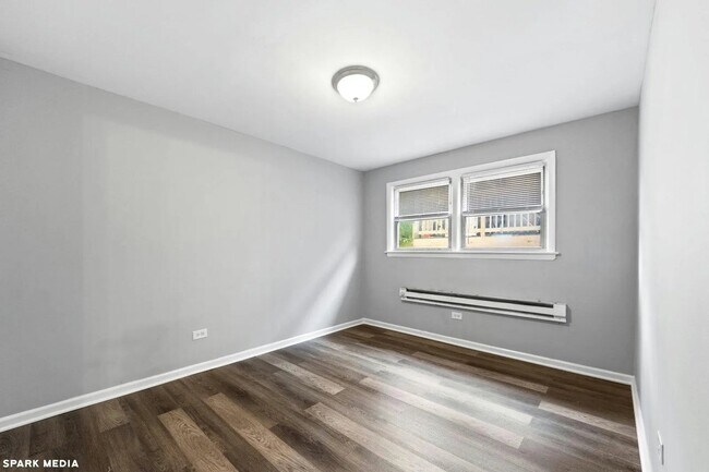 Building Photo - 7617 S Colfax Ave