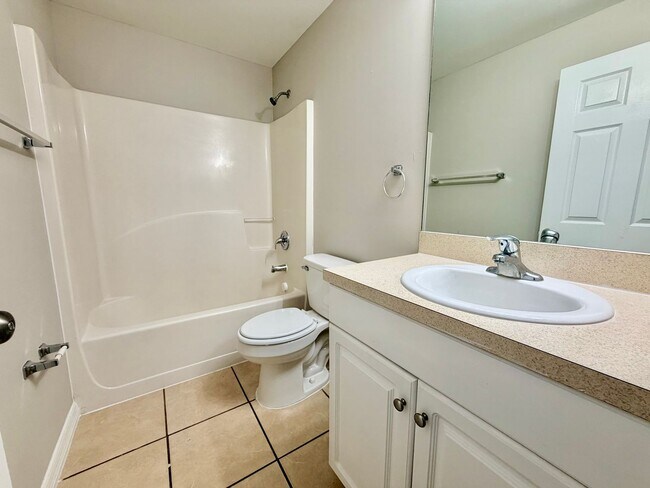 Building Photo - Charming 3BR/2BA Lehigh Acres Duplex with 1-Car Garage | Lawn Care & Salt Service Included