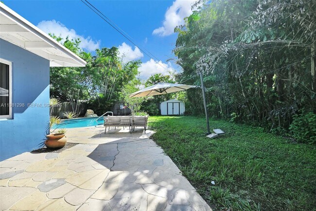 Building Photo - 1328 N Andrews Ave