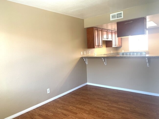 Building Photo - Check out this Freshly Painted and New Flo...