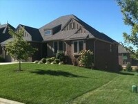 Building Photo - AVAILABLE NOW -  5 Bedroom Executive Home ...