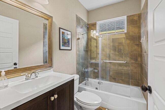 Building Photo - A Sunlit Custom Yellow Cottage in Greystone - Where Comfort Lives!