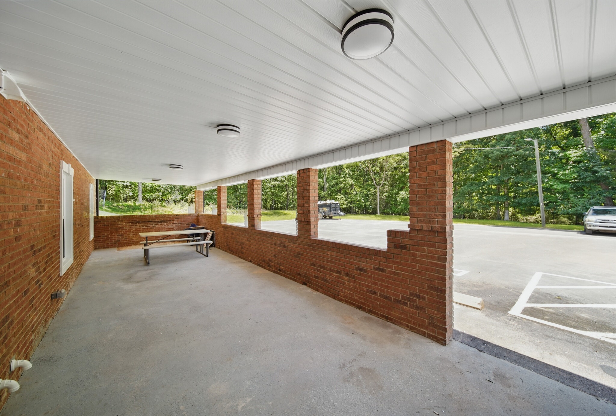 Rear entrance and covered area common space - 216 Legion Dr