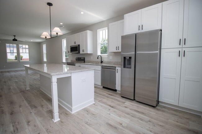 Building Photo - Pick Your Neighbors! Brand-New 3 Bed, 3 Ba...