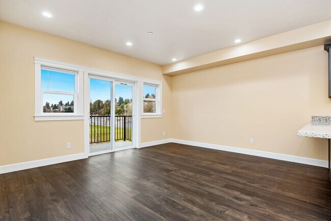 Building Photo - Sophisticated One-Bedroom Living at Marigold Apartments — Available Now