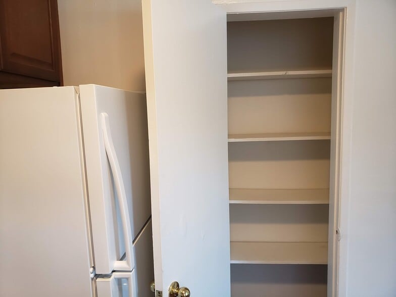 Kitchen w/ Pantry - Mar Vista-Palms Apartments