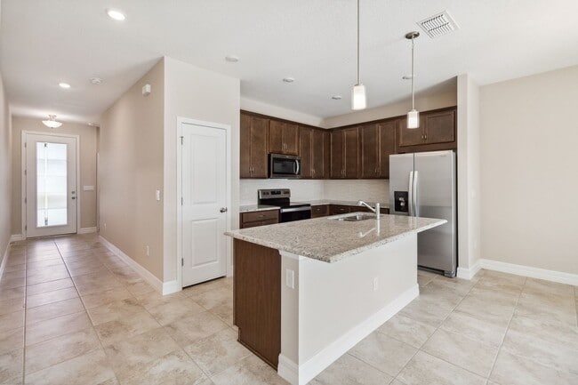 Building Photo - Beautiful New Energy Efficient 4/2 Close t...