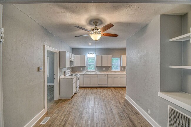 Building Photo - Newly Remodeled Campus Property! Lawn Care Included!