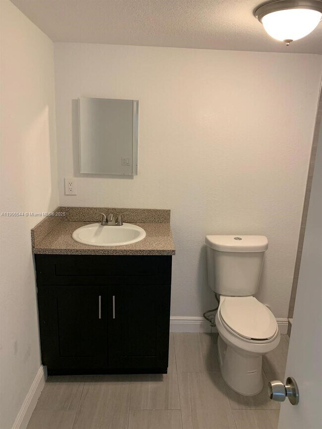 Building Photo - 11635 Royal Palm Blvd