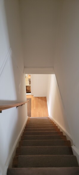 Looking down into entry - 20 E Spring St