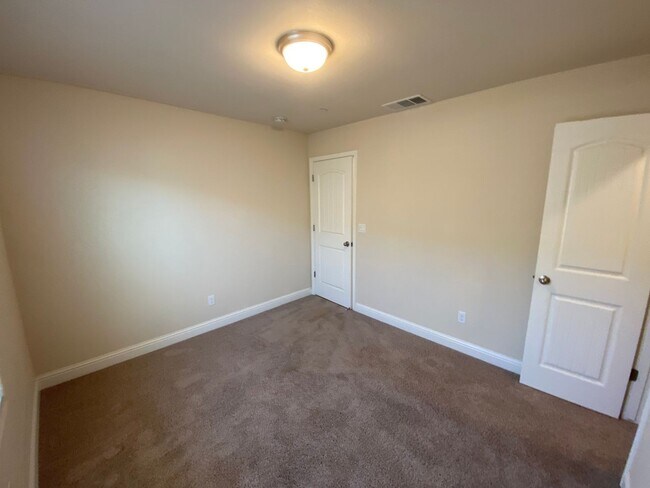 Building Photo - Immaculate like New Home in the gated Windmills at Tule Heights!