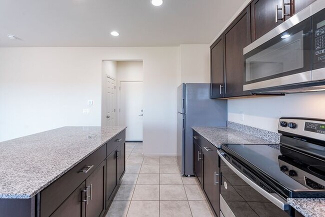 Building Photo - Discover the perfect blend of comfort and ...